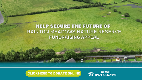 drone image of fields with fundraising message