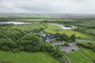 Aerial view of nature reserve with visitor centre in centre