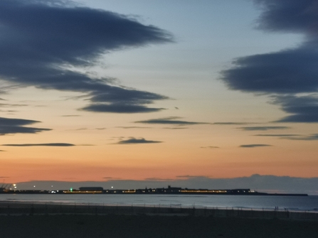 A view of the Seaton Carew coastline at sunset with beach in foreground