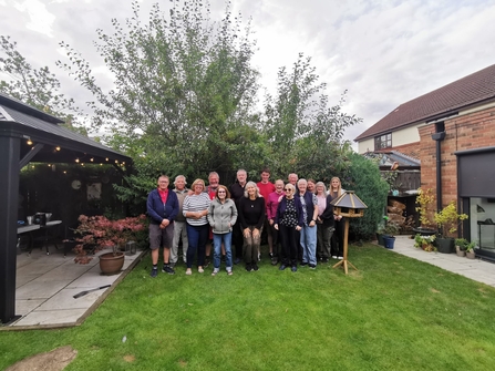 group of people in garden