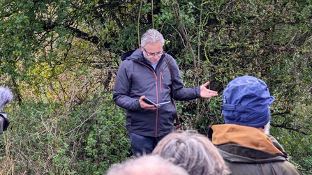 Venerable Rick Simpson, Archdeacon of Auckland, blessing the Bishop's Fen in front of crowd of people