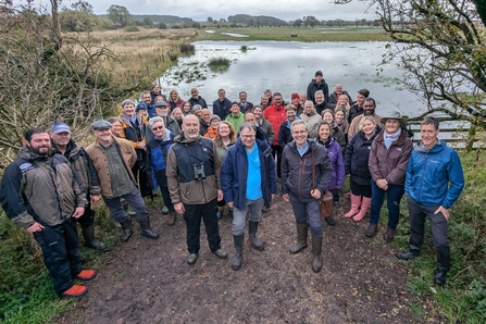 Group of people in front of wetland